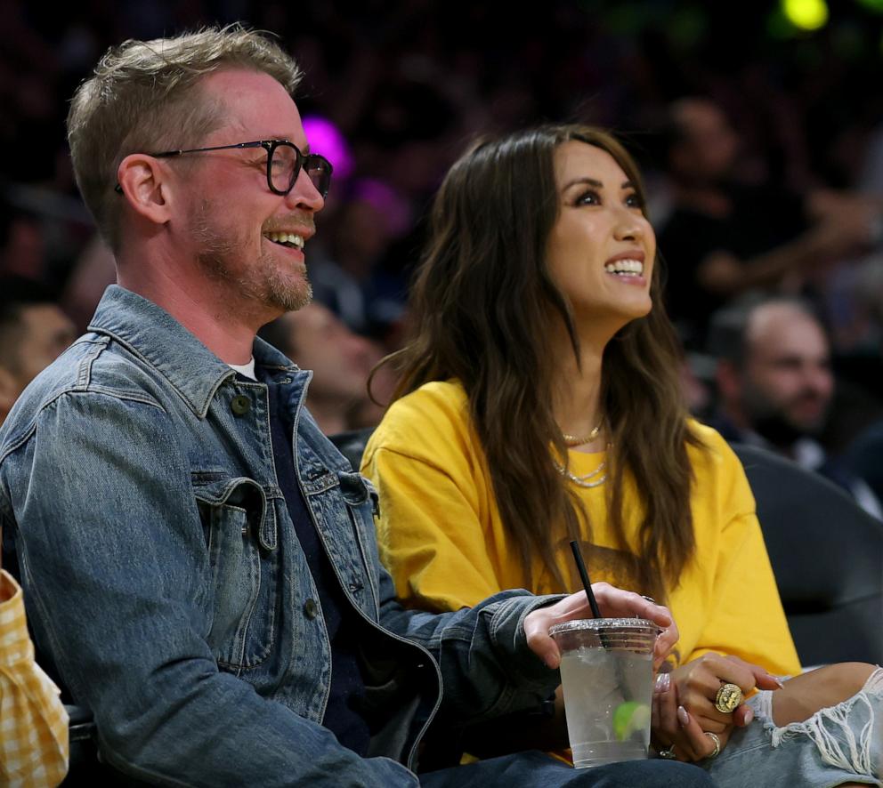 PHOTO: Macaulay Culkin poses for a picture with partner Brenda Song during the game between the Boston Celtics and the Los Angeles Lakers at Crypto.com Arena, Jan. 23, 2025, in Los Angeles.