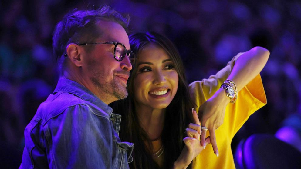 PHOTO: Macaulay Culkin poses for a picture with partner Brenda Song during the game between the Boston Celtics and the Los Angeles Lakers at Crypto.com Arena, Jan. 23, 2025, in Los Angeles.