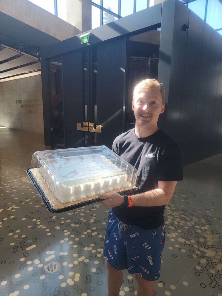 PHOTO: Mac Myers with a Karly Pavlinac Blackburn CV cake delivered by Denise Baldwin via Instacart.