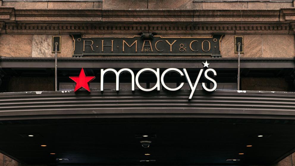 PHOTO: In this Feb. 25, 2020, file photo, signs for the Macy's flagship store are shown on 34th Street in Midtown Manhattan in New York.