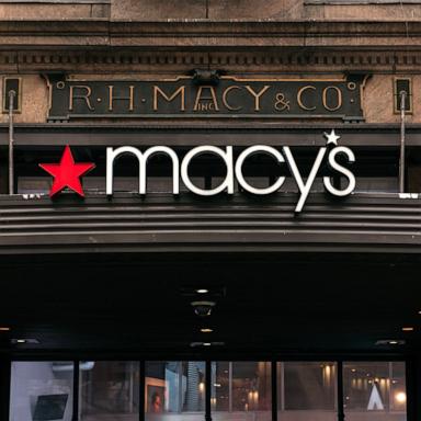 PHOTO: In this Feb. 25, 2020, file photo, signs for the Macy's flagship store are shown on 34th Street in Midtown Manhattan in New York.