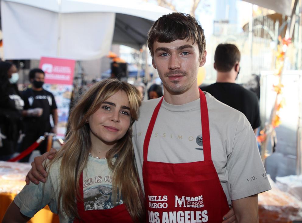 PHOTO: Mae Whitman and Miles Heizer attend the Los Angeles Mission's Annual Thanksgiving event at the Los Angeles Mission on Nov. 24, 2021 in Los Angeles.