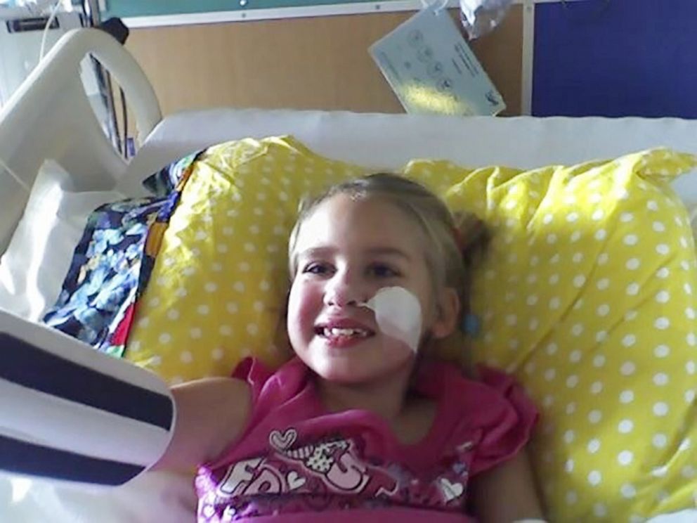 PHOTO: Maegan Johnson dances to Toxic by Britney Spears in 2008 after her first brain surgery.