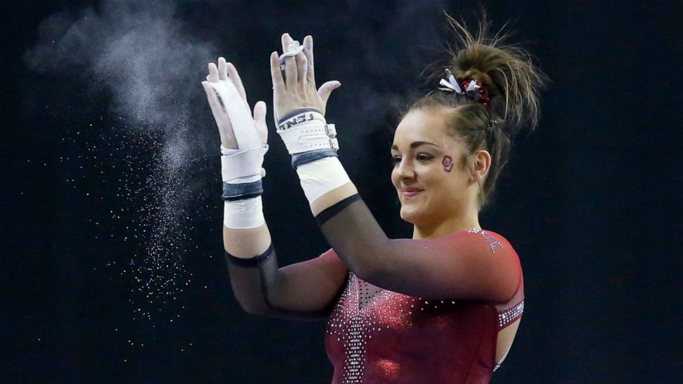 Oklahoma gymnast Maggie Nichols reacts after her routine on the uneven bars in the Perfect 10 Challenge at the Bart and Nadia Sports Experience in Oklahoma City, Feb. 16, 2019.