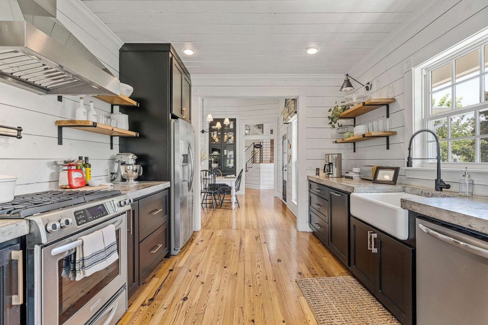 PHOTO: The kitchen at Magnolia House flows directly into a dining room.