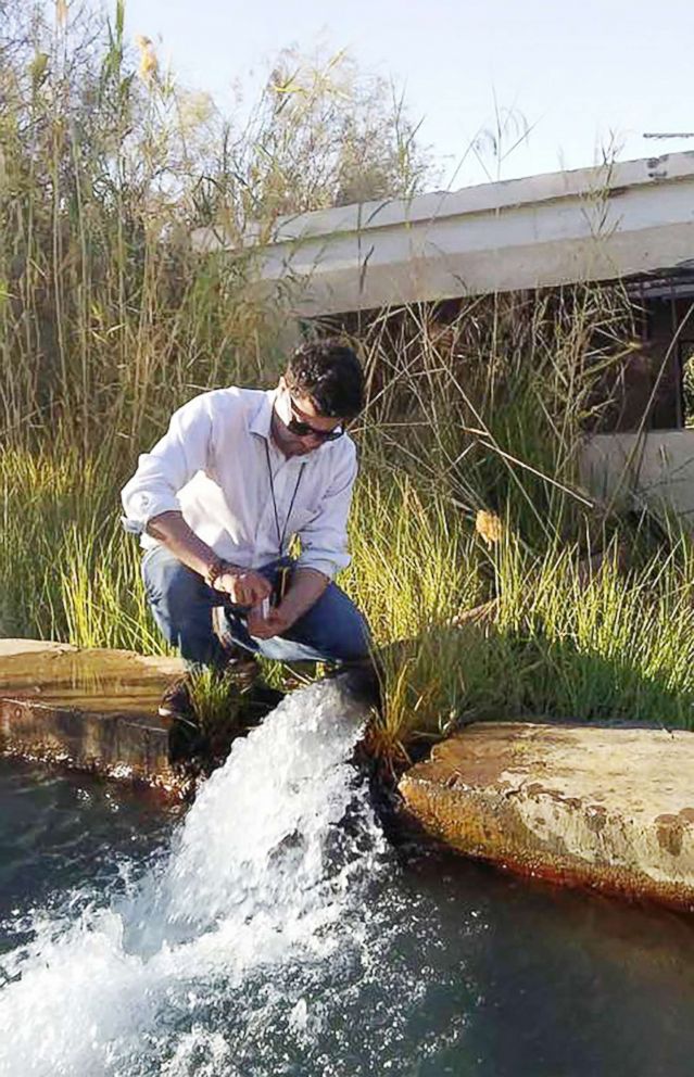 PHOTO: Mahmoud Sherif samples groundwater in the western desert of Egypt.
