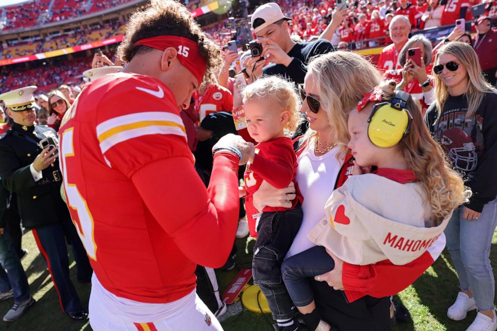 PHOTO: In this Nov. 10, 2024, file photo, Patrick Mahomes of the Kansas City Chiefs fist bumps his son, Bronze, while his wife and daughter, Brittany and Sterling, watch at Arrowhead Stadium in Kansas City, Missouri.