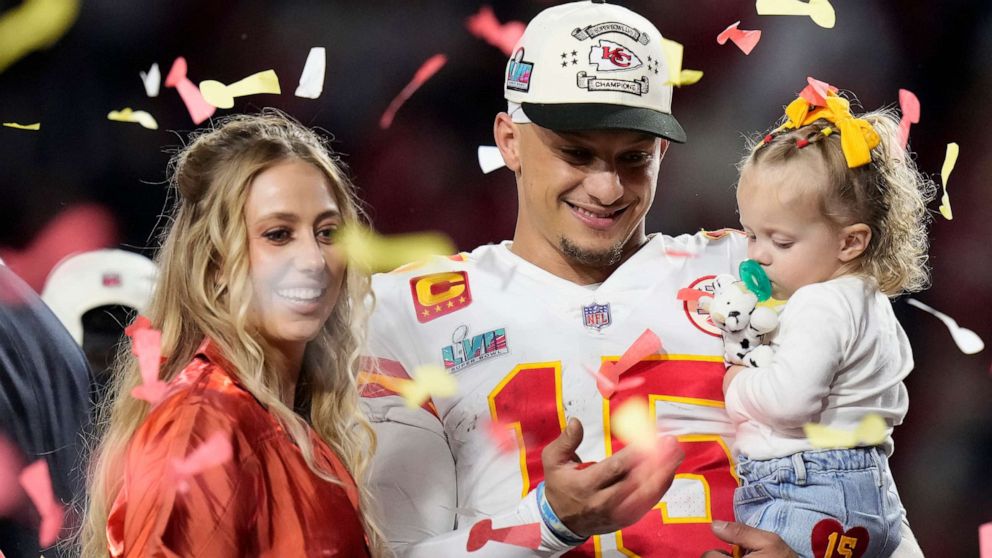 PHOTO: Kansas City Chiefs quarterback Patrick Mahomes and his wife Brittany, left, celebrate with their daughter, Sterling Skye Mahomes, after the NFL Super Bowl LVII football game, Feb. 12, 2023, in Glendale, Ariz.