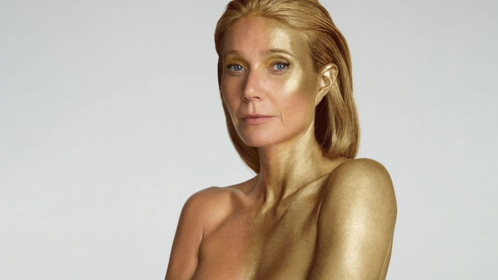 Gwyneth Paltrow poses nude in gold body