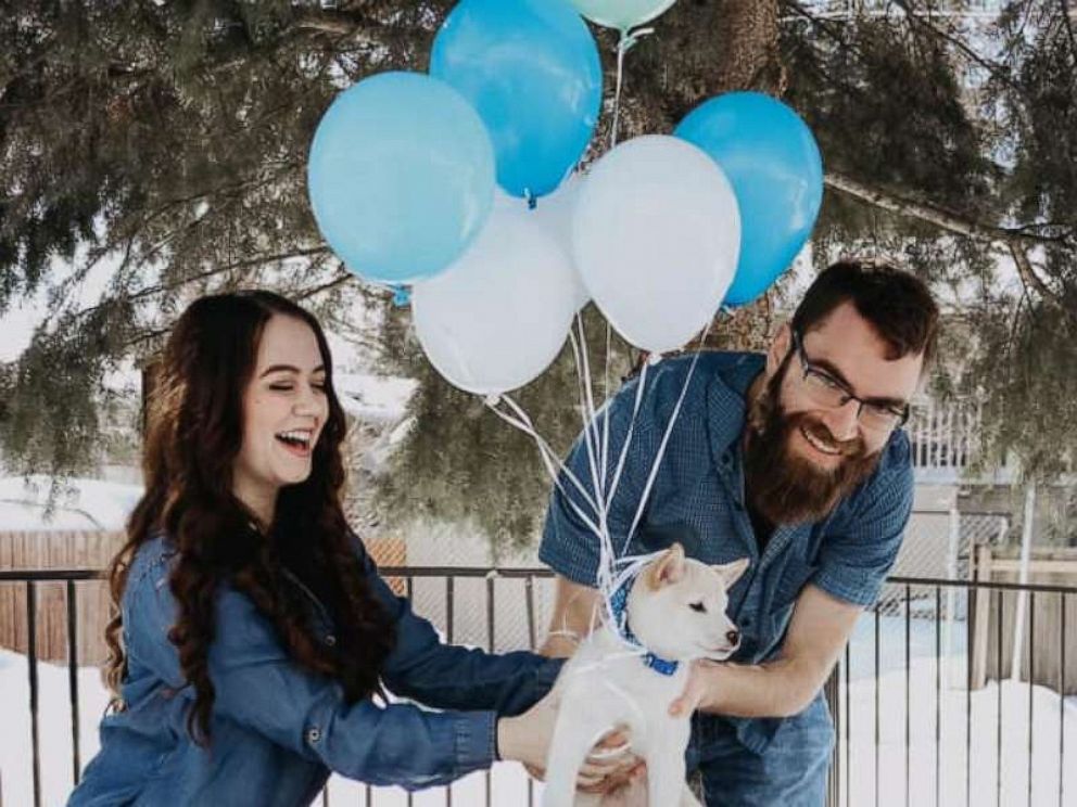 PHOTO: Lily Denesha of Idaho, shared photos of herself and her boyfriend Paul Callahan showing off their newly adopted pup named Percy.