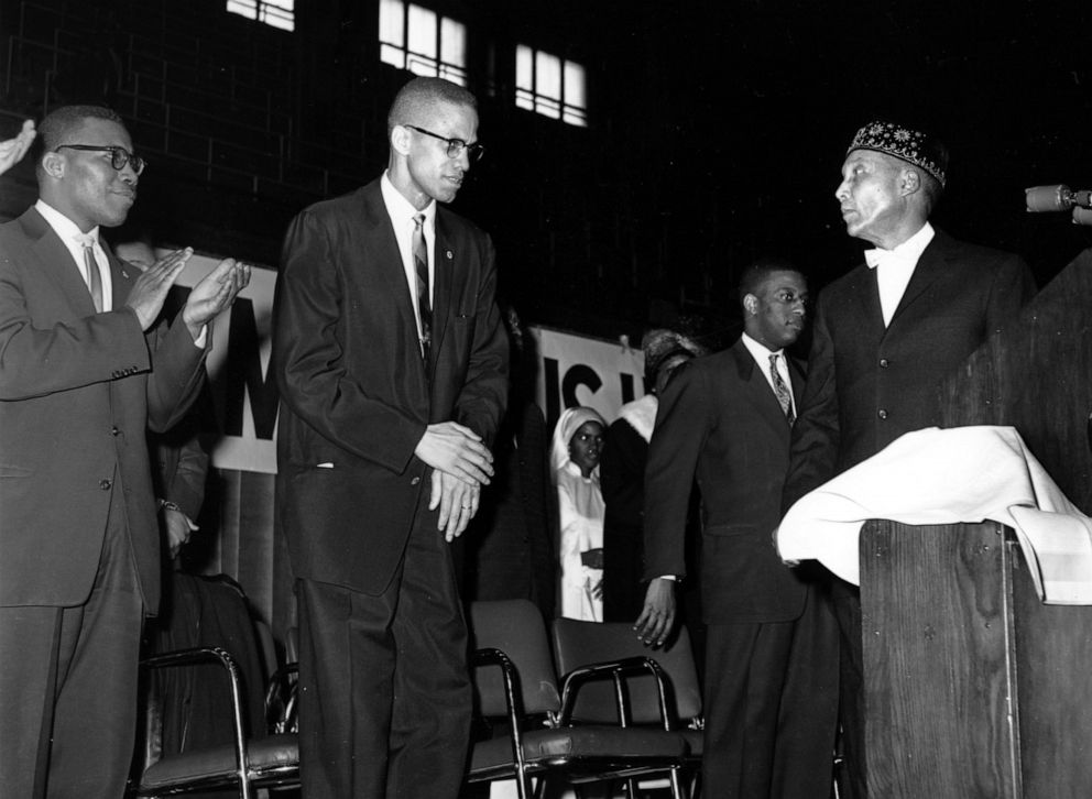 PHOTO: Elijah Muhammad, founder and head of the Nation of Islam, right, introduces Malcolm X in Chicago, Feb. 26, 1961.