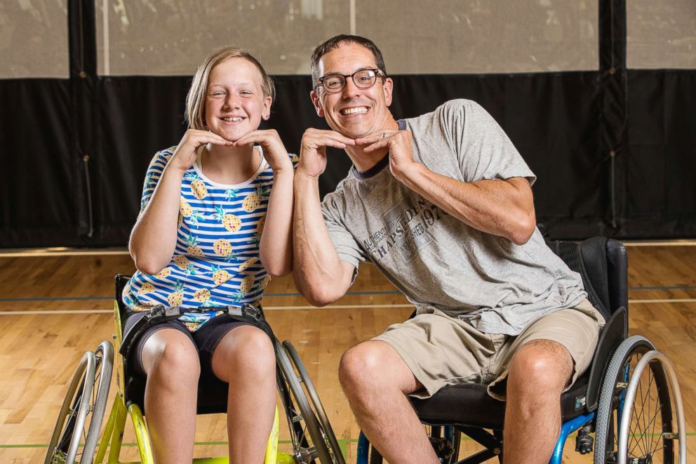 PHOTO: Mackenzie Haag, 13, pictured here with her dad both have familial spastic paraplegia. Her brother has the same condition.