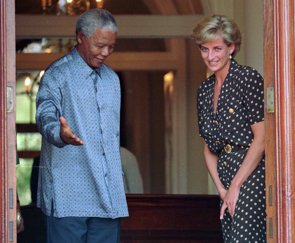 PHOTO: In this March 17, 1997 file photo, South African President Nelson Mandela, left, shows the way to Princess Diana, during a meeting in Cape Town, South Africa.