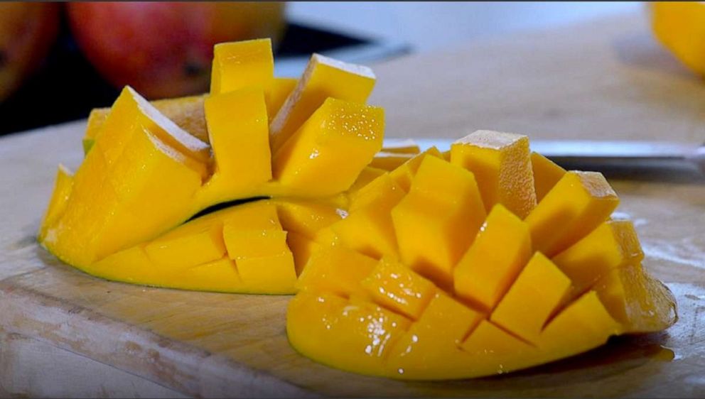 PHOTO: Celebrity chef Cat Cora shows "GMA" that mangos don't have to be so hard to cut.