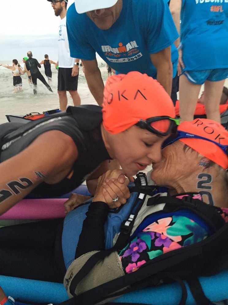 PHOTO: Gruson and Lubetsky share a moment at the 2015 Florida Ironman during the swimming portion.