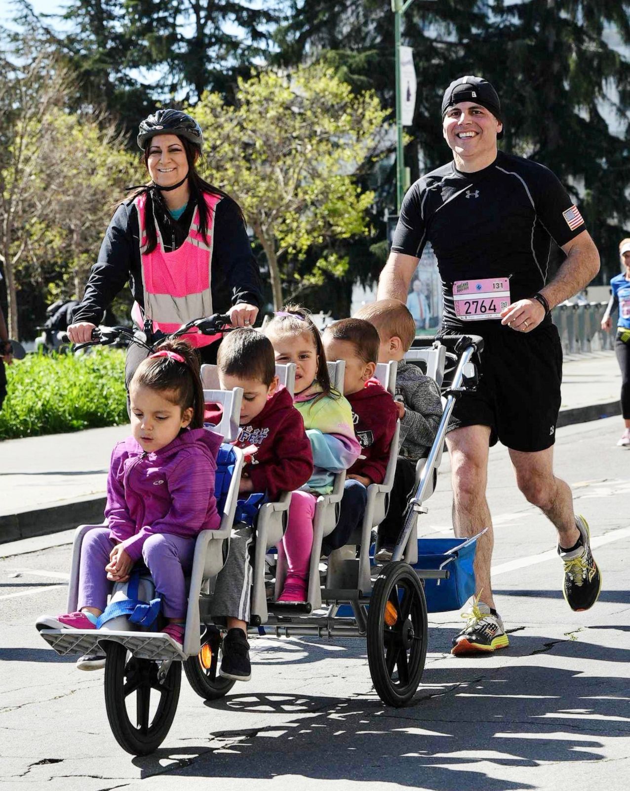 PHOTO: Chad Kempel pushing a stroller with his kids.