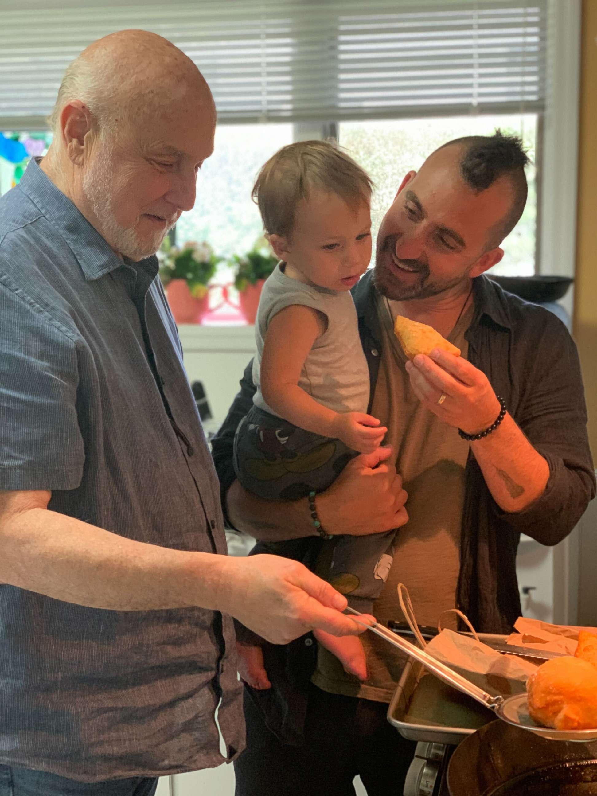 PHOTO: Larry Forgione, Marc Forgione and his three-year-old son, Sonny, eating and cooking at home.
