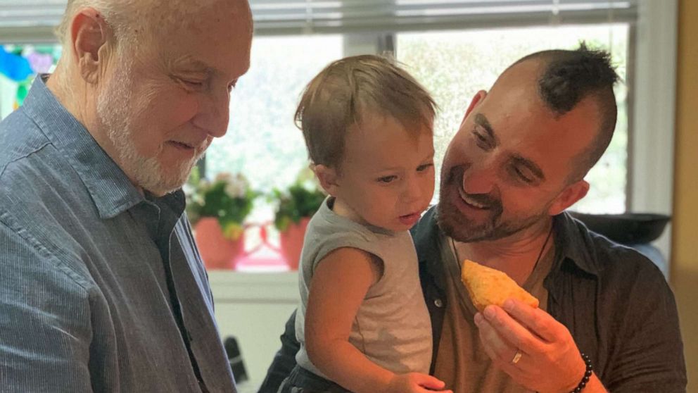 Larry Forgione, Marc Forgione and his three-year-old son, Sonny, eating and cooking at home.