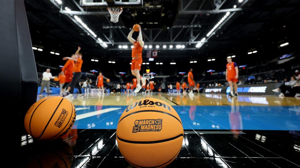 PHOTO: The March Madness logo is pictured on a Wilson basketball at Amica Mutual Pavillion as the Clemson Tigers practice ahead of the NCAA Men's Basketball Tournament, on March 19, 2025, in Providence, Rhode Island.