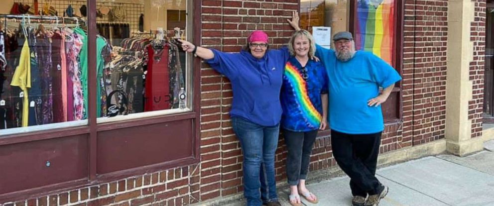 PHOTO: Margies Closet employees smile in front of their store.