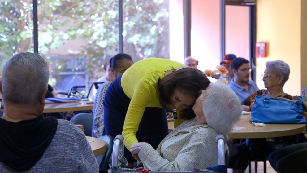 PHOTO: Maria Elvira Salazar, a Republican candidate in Florida's 27th congressional district kissed by a supporter at a senior citizen's home near Coral Gables.