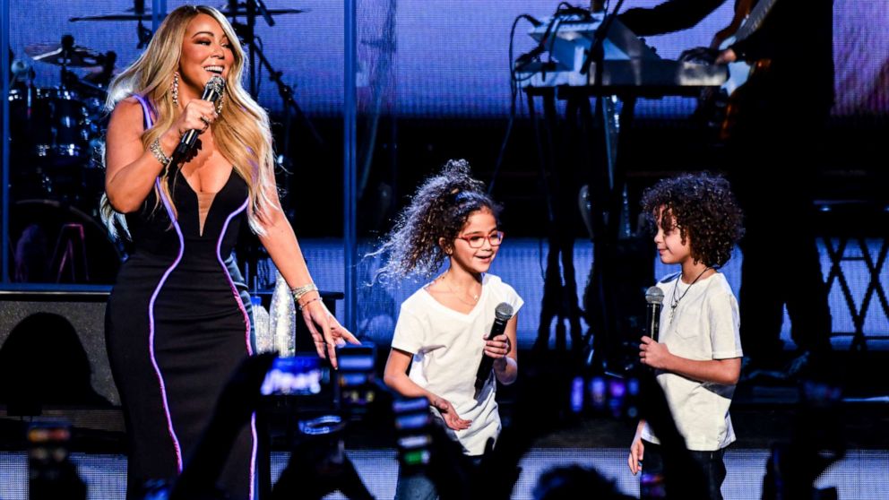 PHOTO: Mariah Carey performs onstage with Monroe Cannon and Moroccan Cannon during the the Caution World Tour at Fox Theater on March 05, 2019 in Atlanta, Georgia.