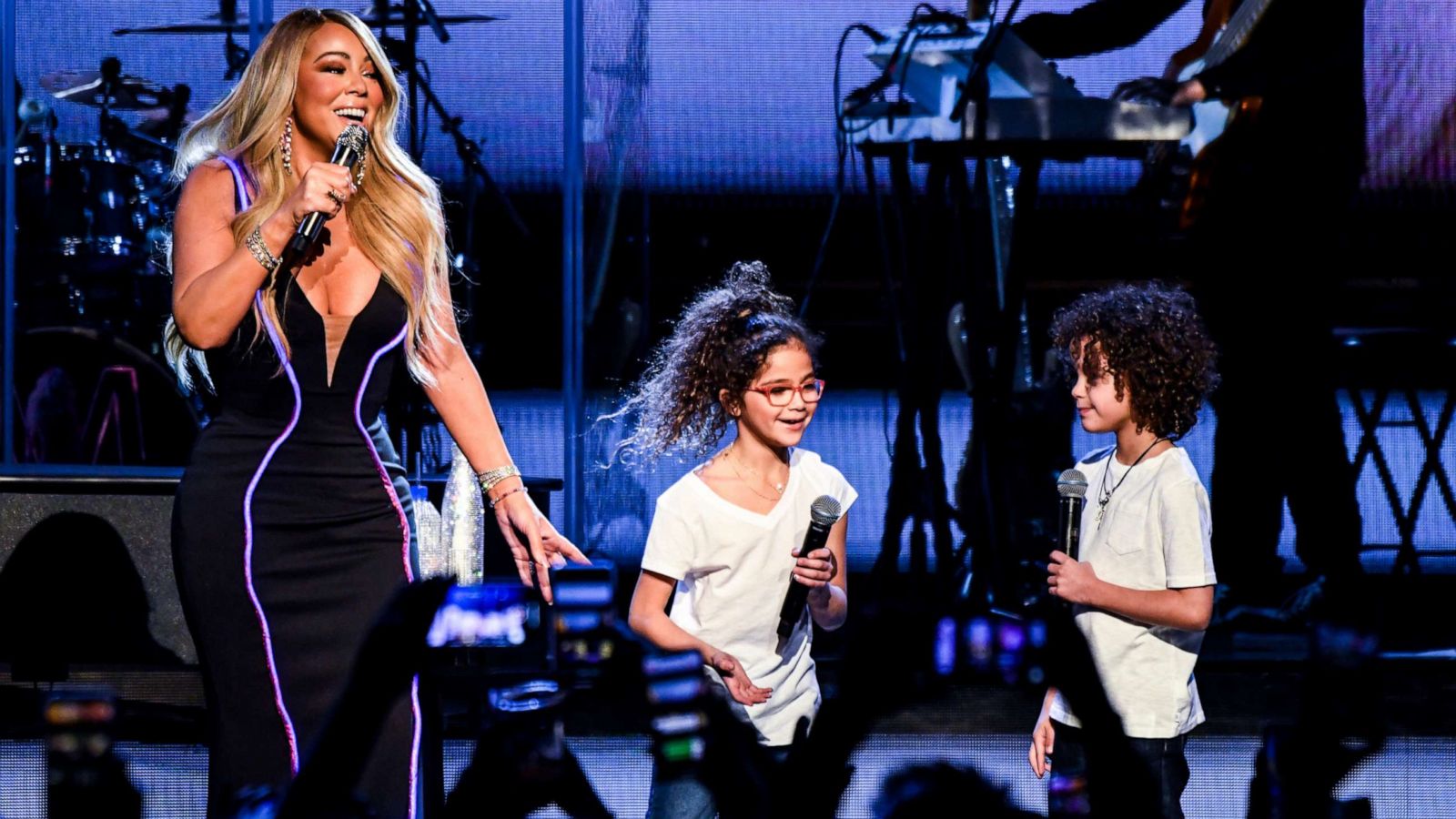 PHOTO: Mariah Carey performs onstage with Monroe Cannon and Moroccan Cannon during the the Caution World Tour at Fox Theater on March 05, 2019 in Atlanta, Georgia.