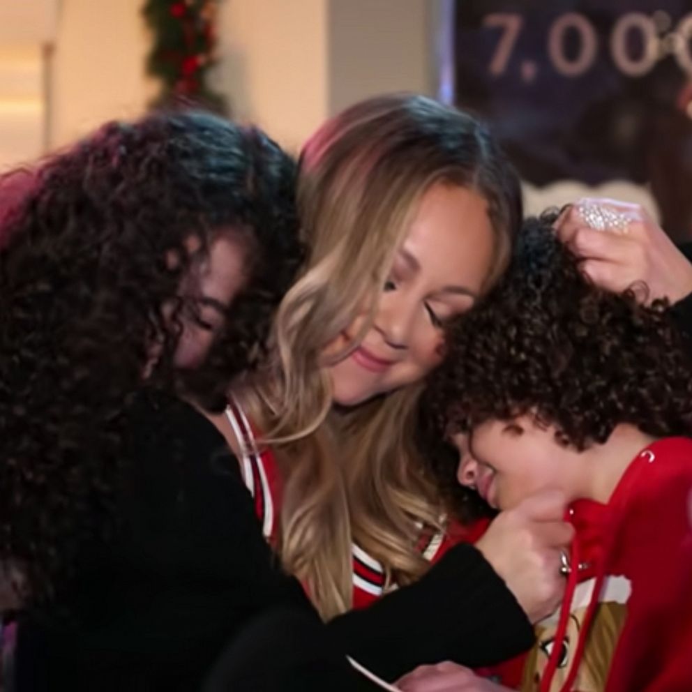 VIDEO: Mariah Carey belts out a high note as she gets first vaccine shot 
