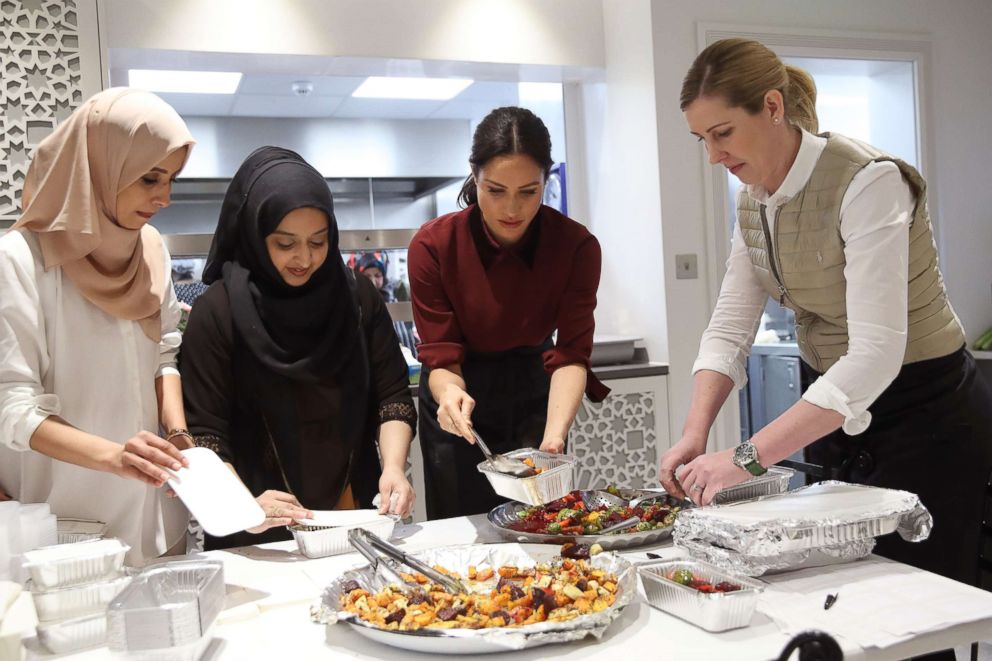 PHOTO: Meghan Markle, Duchess of Sussex with chef Clare Smyth as they visit the Hubb Community Kitchen to see how funds raised by the 'Together: Our Community' Cookbook are making a difference at Al Manaar, North Kensington, Nov. 21, 2018 in London.