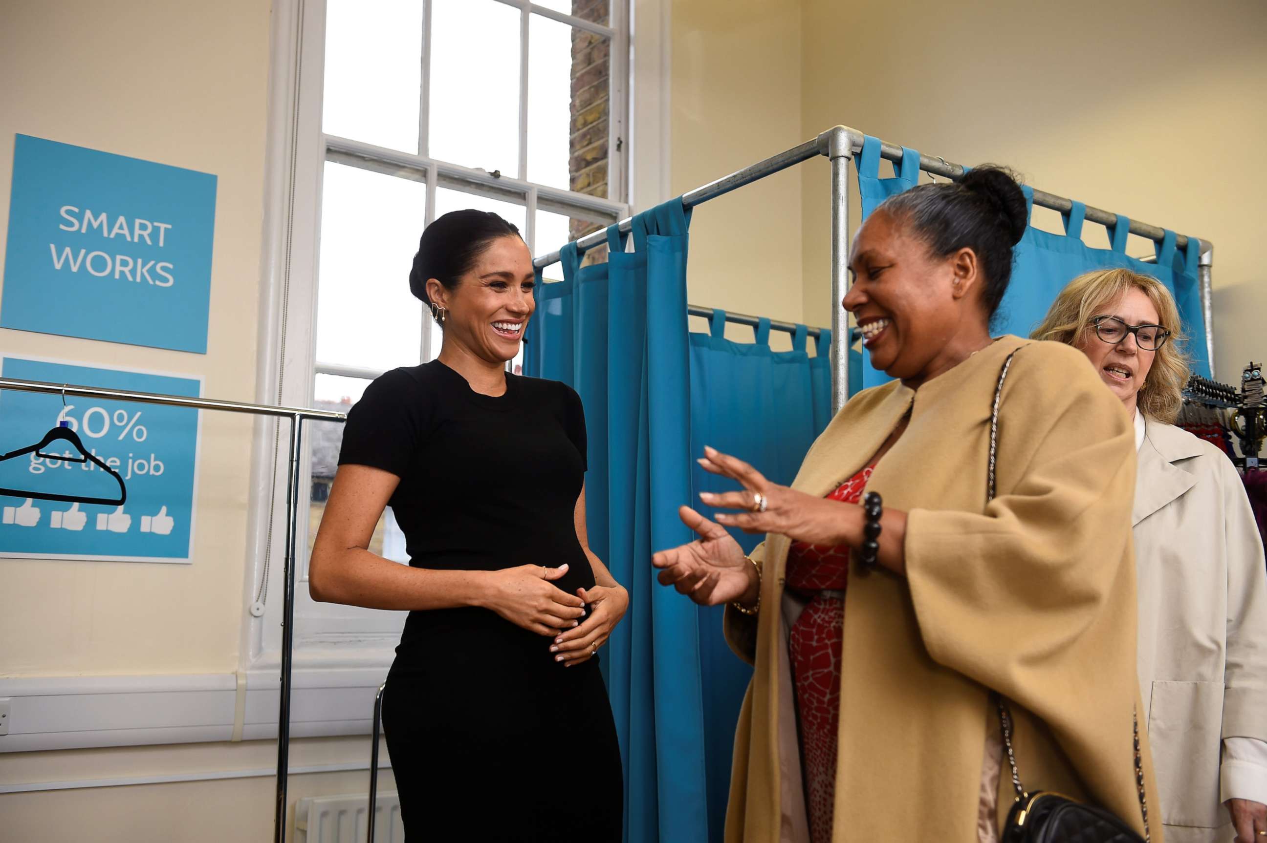 PHOTO: Britain's Meghan, the Duchess of Sussex talks with Patsy Wardally during her visit to Smart Works, a charity to which she has become patron, at St Charles hospital in west London on Jan 10, 2019.