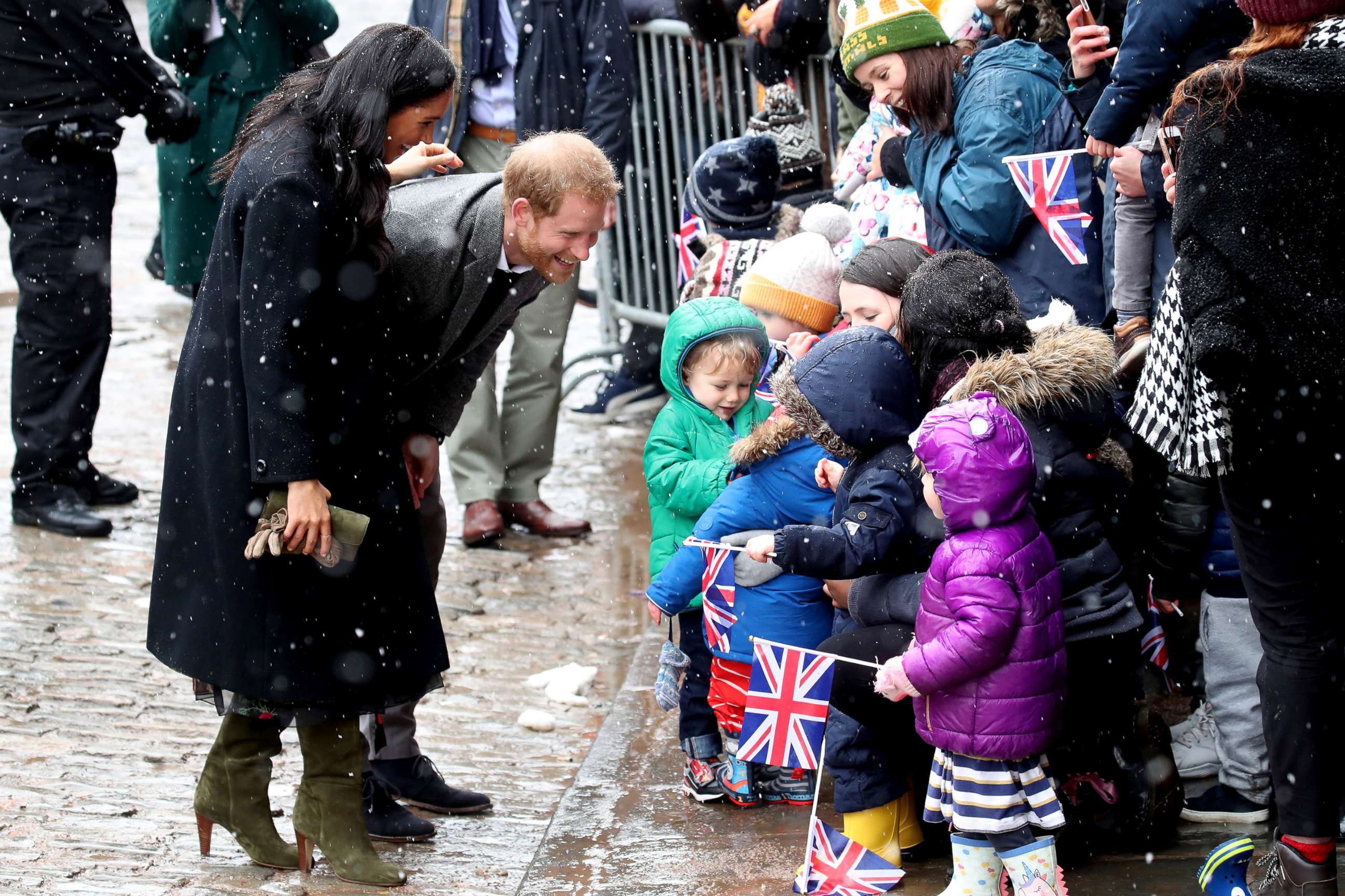 PHOTO: Meghan, Duchess of Sussex and Prince Harry, Duke of Sussex meet children in the crowd as they arrive at the Bristol Old Vic, Feb. 1, 2019, in Bristol, England.
