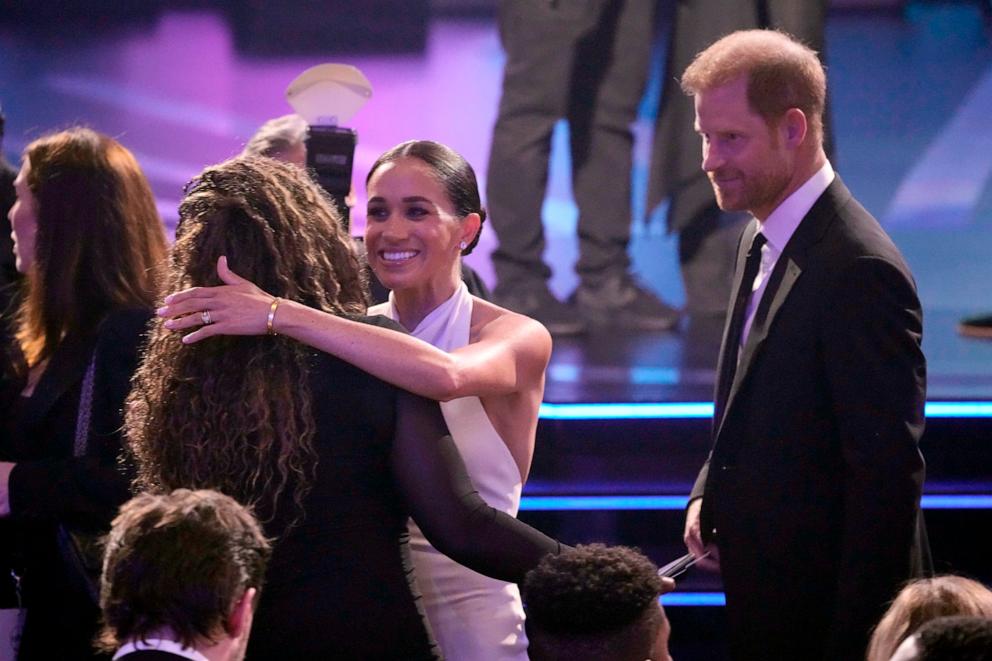 PHOTO: Meghan Markle, center and Prince Harry, right, arrive at the ESPY awards on July 11, 2024, at the Dolby Theatre in Los Angeles. 