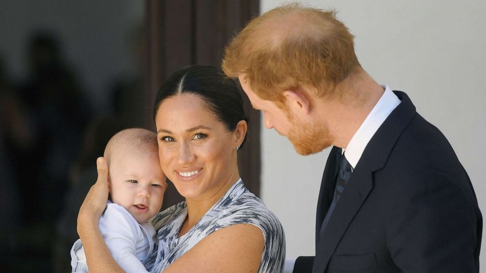 Meghan, Duchess of Sussex and Britain's Prince Harry hold their son Archie at the Desmond & Leah Tutu Legacy Foundation in Cape Town, South Africa, Sept. 25, 2019.