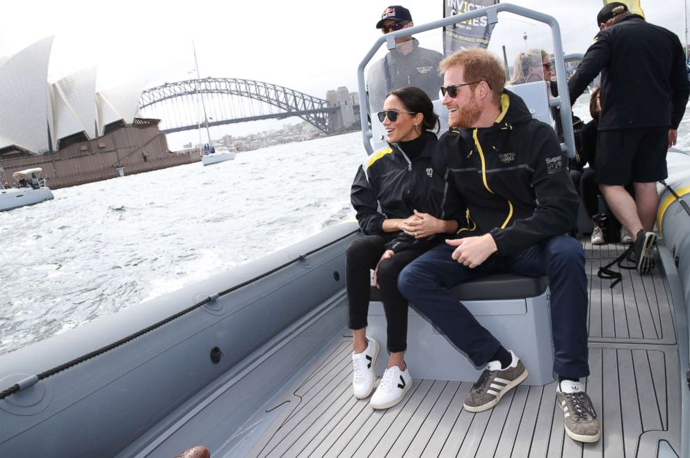 PHOTO: Meghan, Duchess of Sussex and Prince Harry, Duke of Sussex on Sydney Harbour looking out at Sydney Opera House and Sydney Harbour Bridge at Sydney Olympic Park, Oct. 21, 2018.