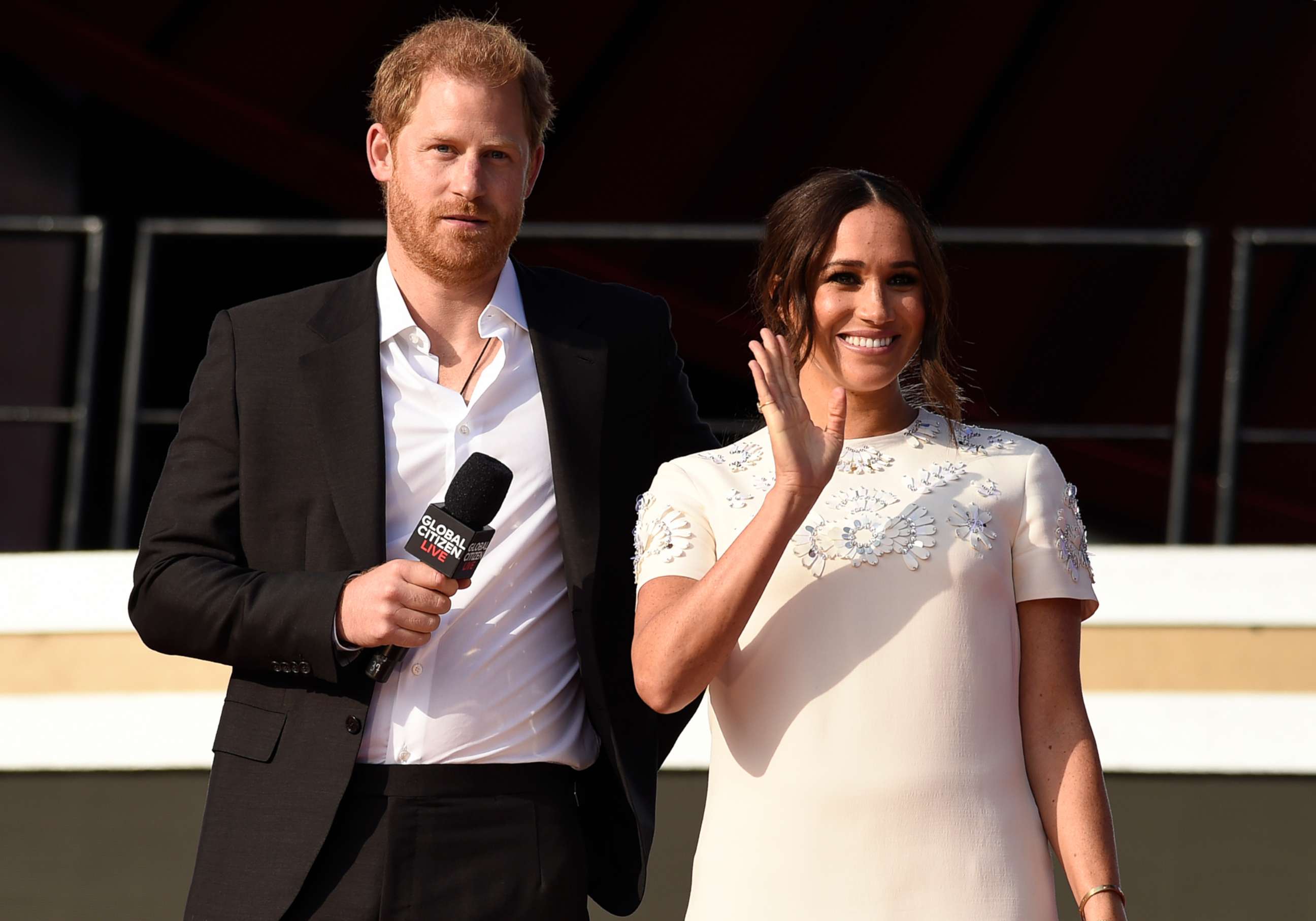 PHOTO: Prince Harry, the Duke of Sussex, left, and Meghan, the Duchess of Sussex speak at Global Citizen Live in Central Park on Saturday, Sept. 25, 2021, in New York.