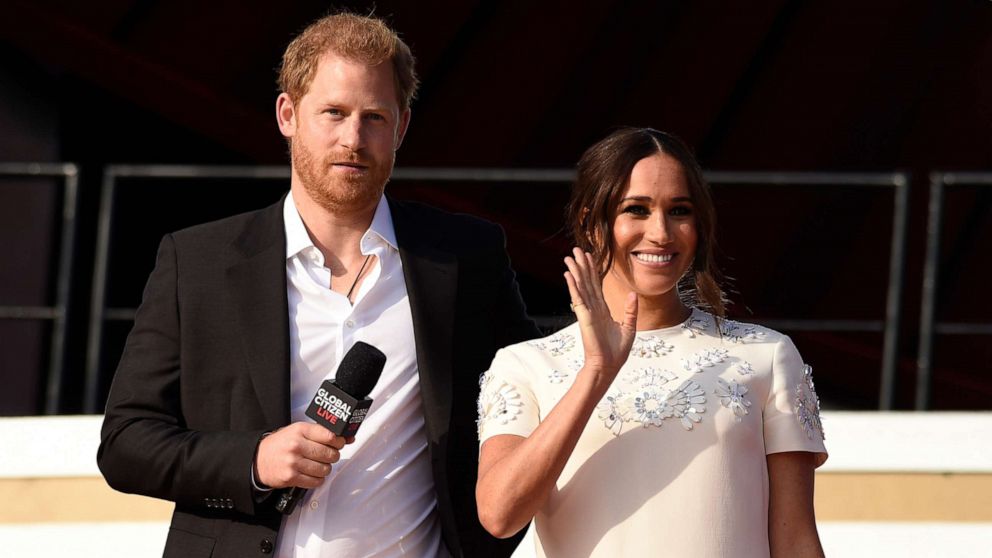 PHOTO: Prince Harry, the Duke of Sussex, left, and Meghan, the Duchess of Sussex speak at Global Citizen Live in Central Park on Saturday, Sept. 25, 2021, in New York.