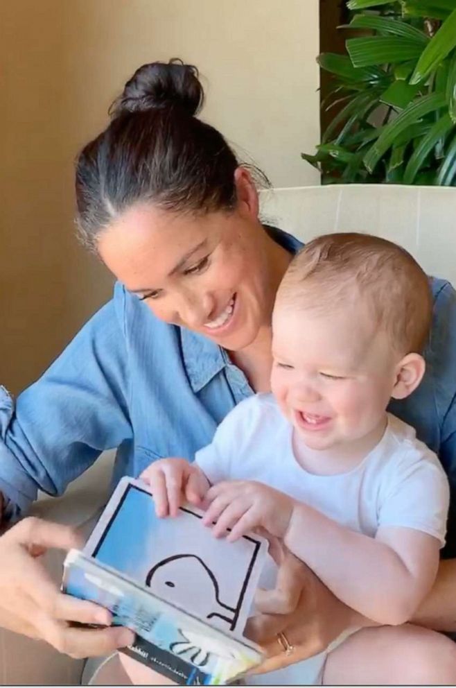 PHOTO: Meghan, the Duchess of Sussex, reads "Duck! Rabbit!" to her son Archie for his first birthday.