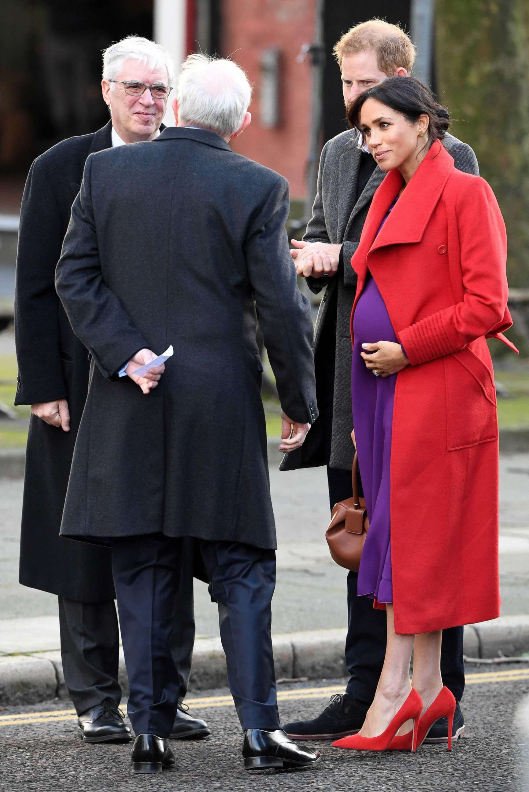 PHOTO: Britain's Prince Harry, Duke of Sussex and Meghan Markle, Duchess of Sussex are greeted as they arrive to visit Birkenhead, northwest England, Jan. 14, 2019.