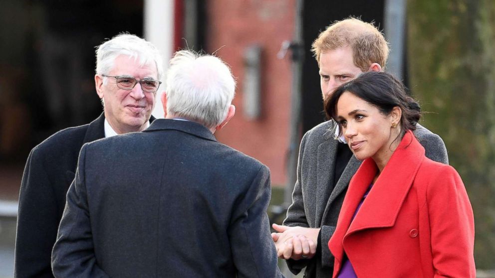 PHOTO: Britain's Prince Harry, Duke of Sussex and Meghan Markle, Duchess of Sussex are greeted as they arrive to visit Birkenhead, northwest England, Jan. 14, 2019.