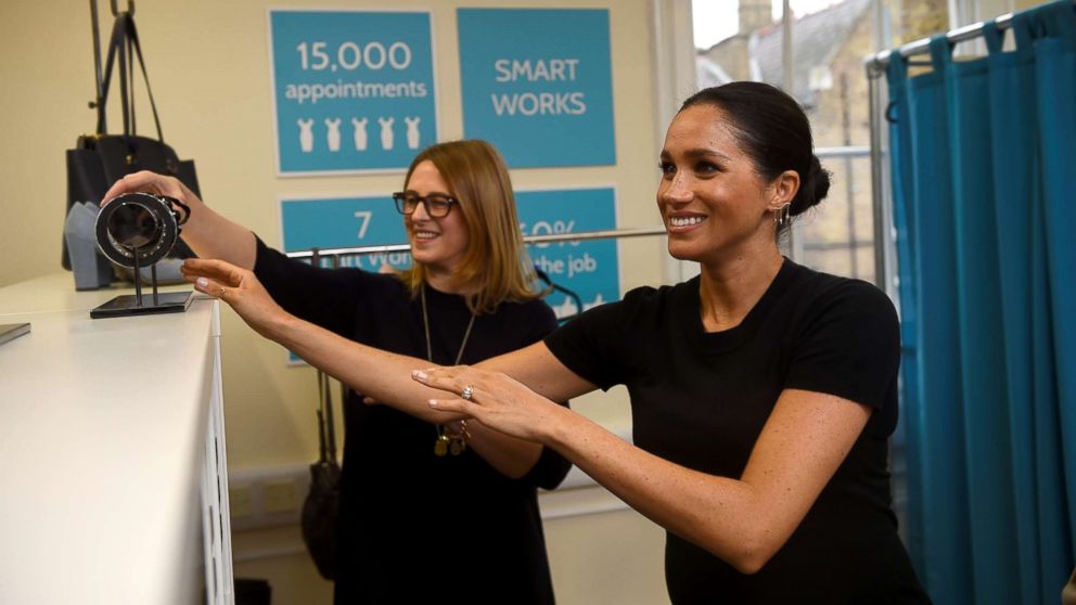 PHOTO: Britain's Meghan Markle, Duchess of Sussex picks out a bracelet during her visit to Smart Works, a charity to which she has become patron, at St Charles hospital in west London, Jan. 10, 2019.