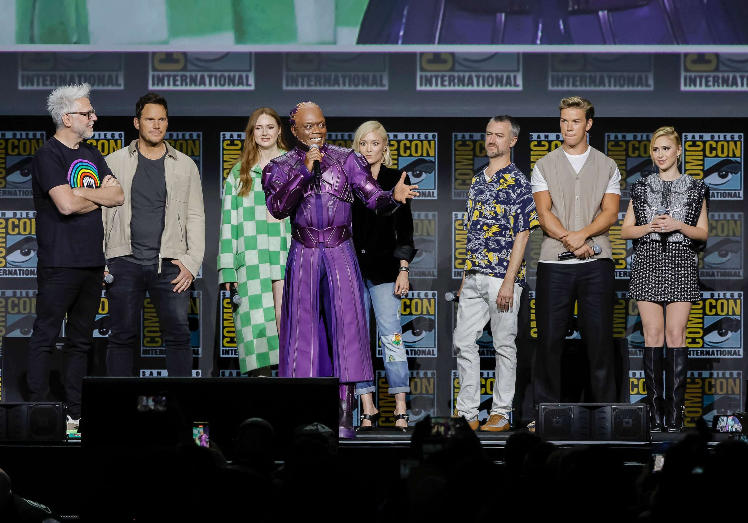 PHOTO: From left, James Gunn, Chris Pratt, Karen Gillan, Chukwudi Iwuji, Pom Klementieff, Sean Gunn, Will Poulter, and Maria Bakalova speak onstage during Comic-Con, July 23, 2022, in San Diego, Calif.