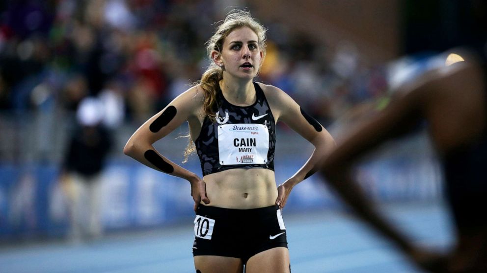 PHOTO: In this April 29, 2016, file photo, Mary Cain walks off the track after competing in the women's special 1500-meter run at the Drake Relays athletics meet in Des Moines, Iowa.