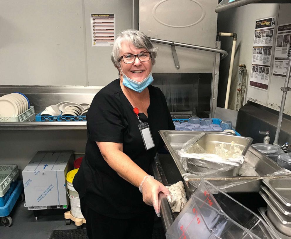 PHOTO: Mary Daniel is pictured after she took a job washing dishes at Rosecastle Assisted Living and Memory Care facility in Jacksonville, Fla., in order to stay close to her husband, Steve.