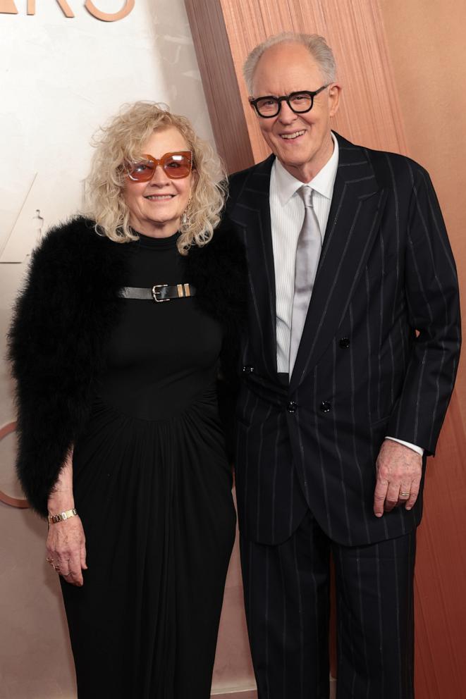 PHOTO: (L-R) Mary Yeager and John Lithgow attend the 97th Annual Oscars on March 02, 2025 in Hollywood, Calif.