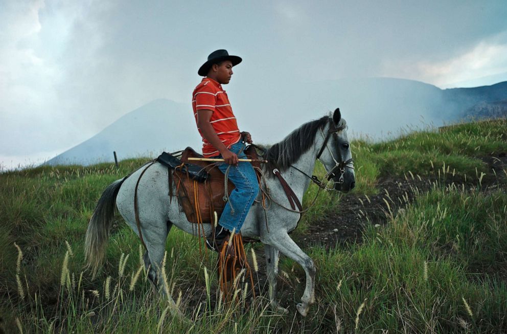 PHOTO: A man on horseback rides past Masaya Volcano, a shield volcano south of Managua, Nicaragua, Sept. 15, 2012.