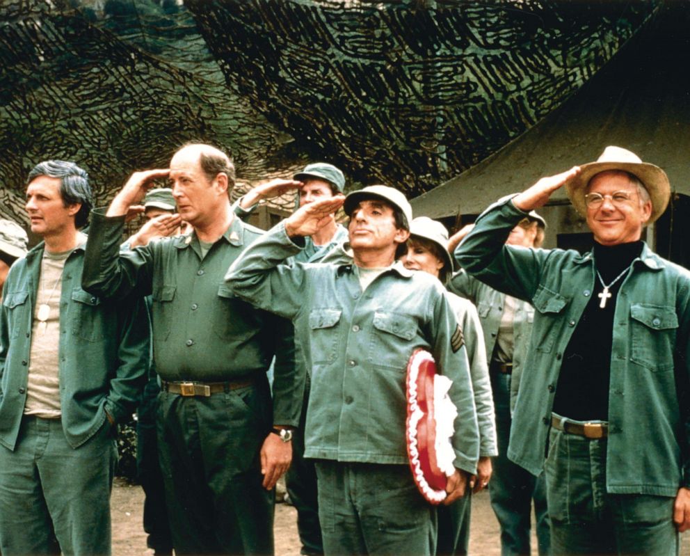 PHOTO: The cast of "Mash" salute in a publicity still, circa 1975.