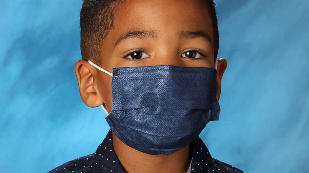 Mason Peoples, a first-grade student in Las Vegas, took his school photo wearing a face mask.