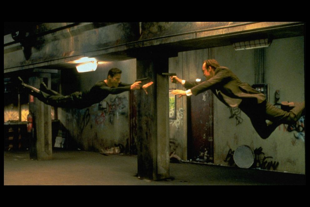 PHOTO: Keanu Reeves and Hugo Weaving face each other in a scene from Andy and Larry Wachowski's 1999 movie The Matrix.