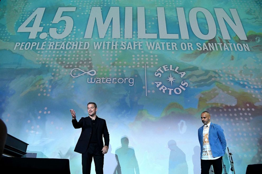 PHOTO: Matt Damon and Anheuser-Busch InBev VP of Global Brands Tim Ovadia speak onstage during The World's Most Fascinating Dinner by Stella Artois, at Hall des Lumieres, on Sept. 21, 2023, in New York.