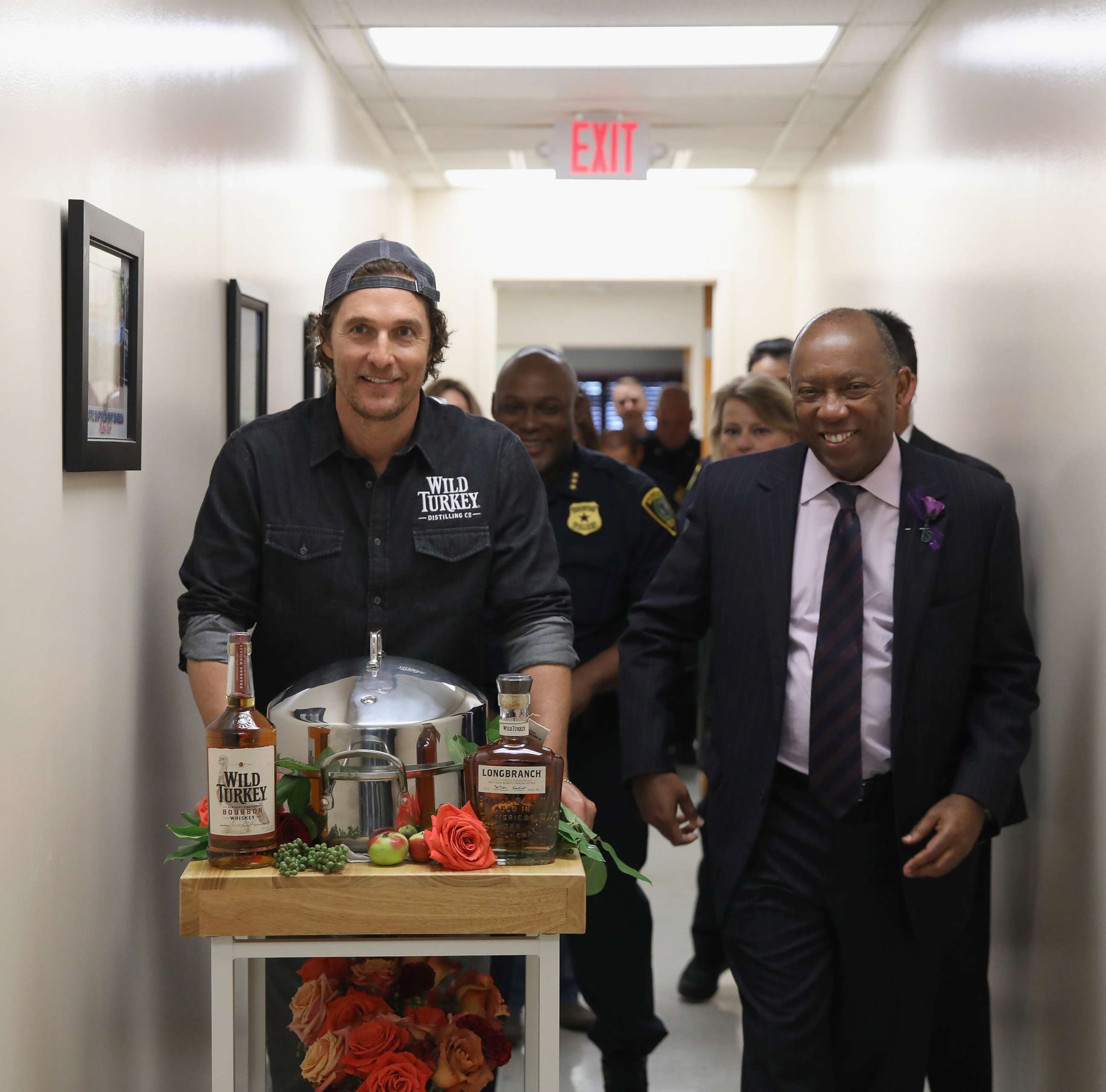 PHOTO: Matthew McConaughey and Houston's Mayor Sylvester Turner surprise Houston's Police Department during Wild Turkey gives back 2018, Oct. 28, 2018, in Houston, Texas.